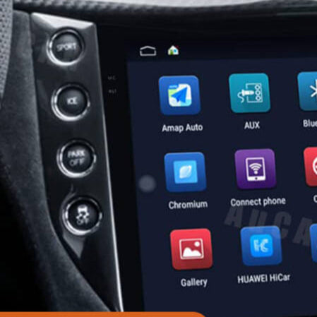 Car dashboard with a touchscreen display showing various app icons after installation.
