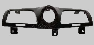 Carbon fiber dashboard panel on a white background