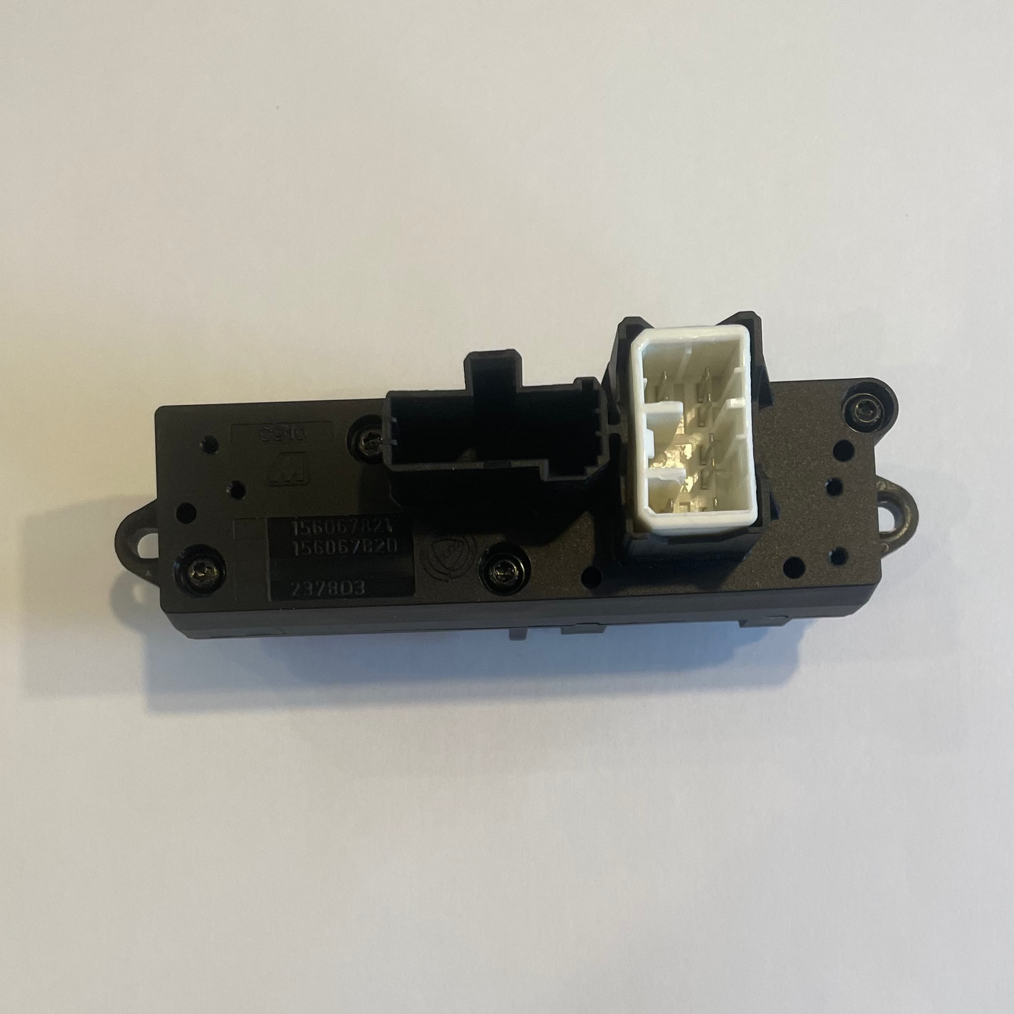Mechanical component on a white sheet of paper