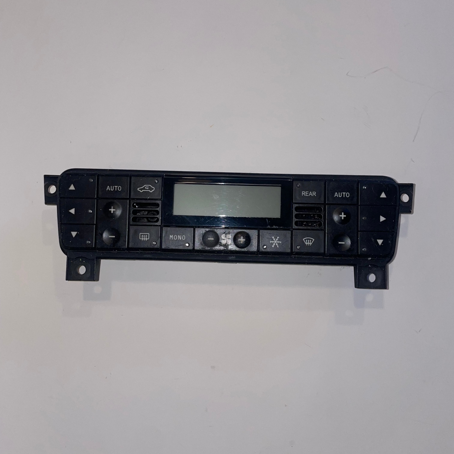 Car dashboard control panel on a white background